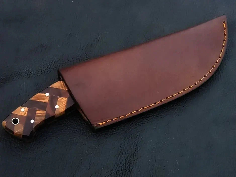 Handmade Damascus Steel Knife C232 with patterned handle in leather sheath