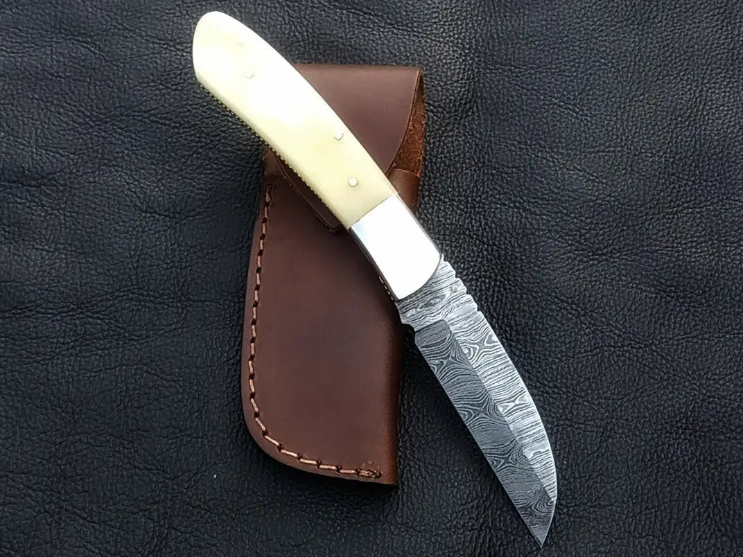 Handmade Damascus Steel Folding Knife with Bone Handle for collectors and enthusiasts