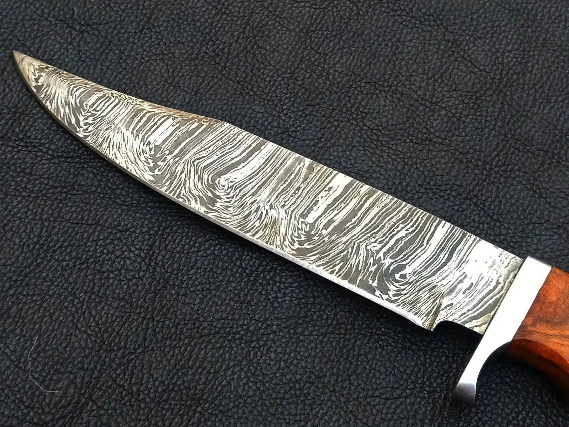 Handmade Damascus Steel Bowie -C146, showcasing intricate pattern and sharp blade design
