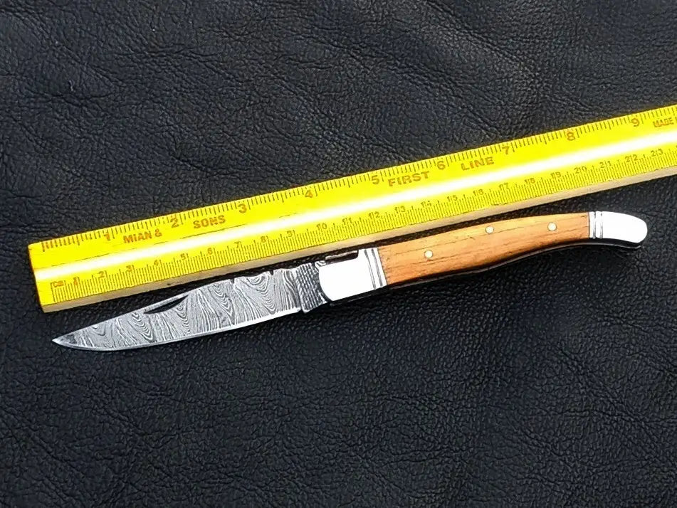 Handmade Damascus Steel Folding Knife - C161 with intricate patterns and durable design