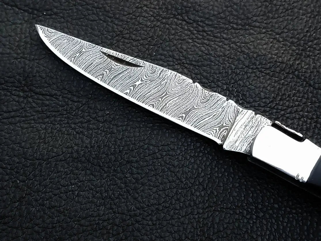 Handmade Damascus Steel Folding Knife -C162 with intricate blade patterns and design