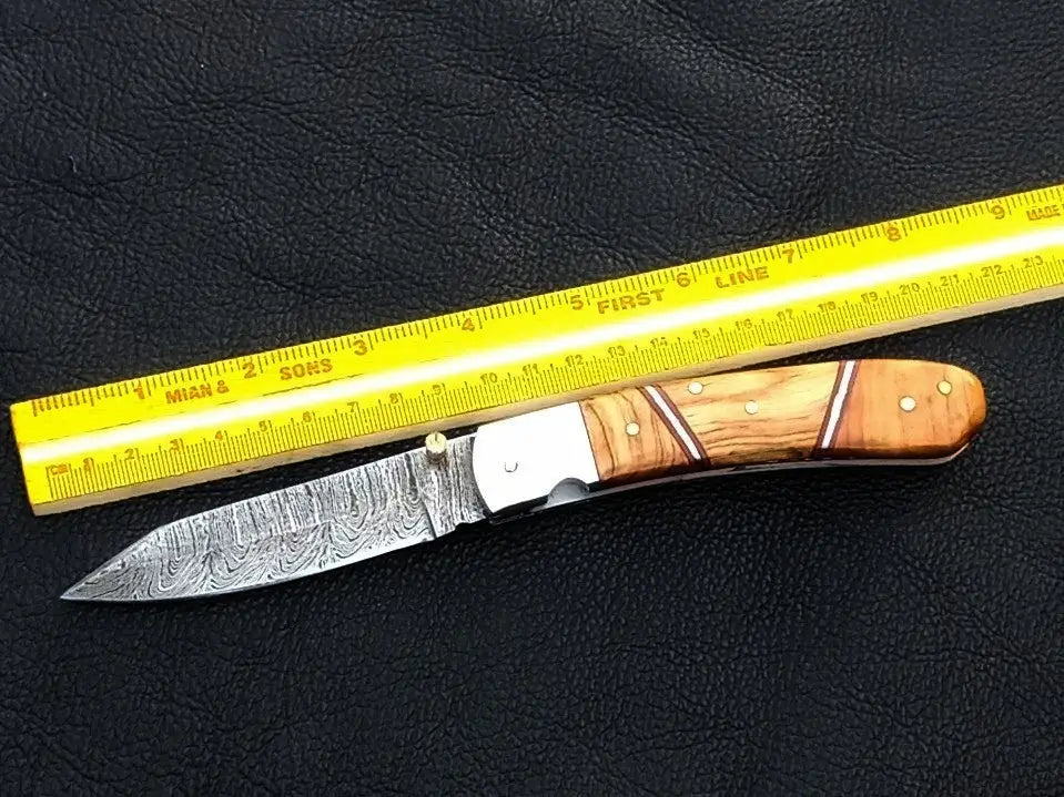 Handmade Damascus Steel Folding Knife - C171 with intricate patterns and sharp blade