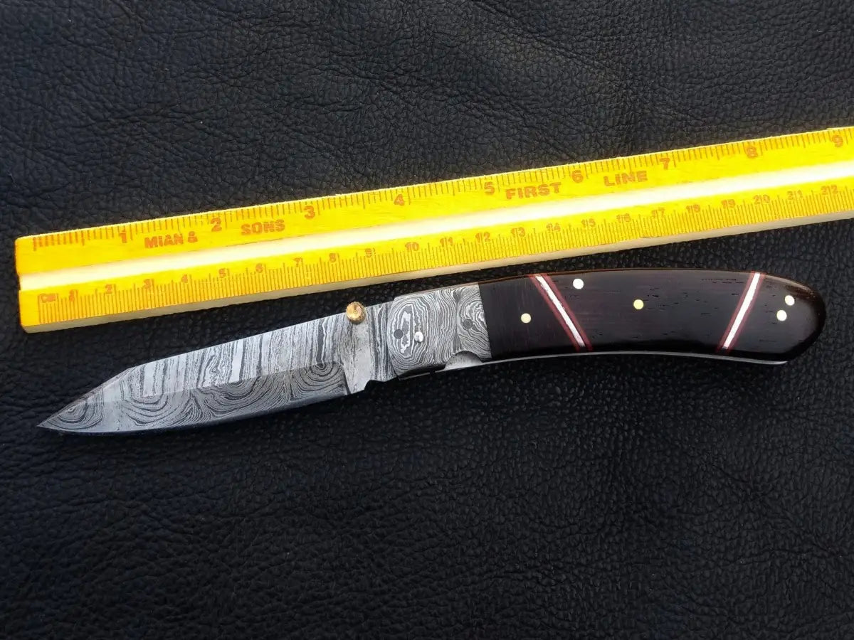 Handmade Damascus Steel Folding Knife C173 with intricate patterns and superior craftsmanship