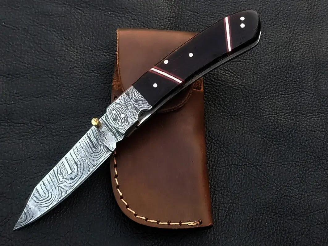 Handmade Damascus Steel Folding Knife - C173 showcases intricate design and craftsmanship