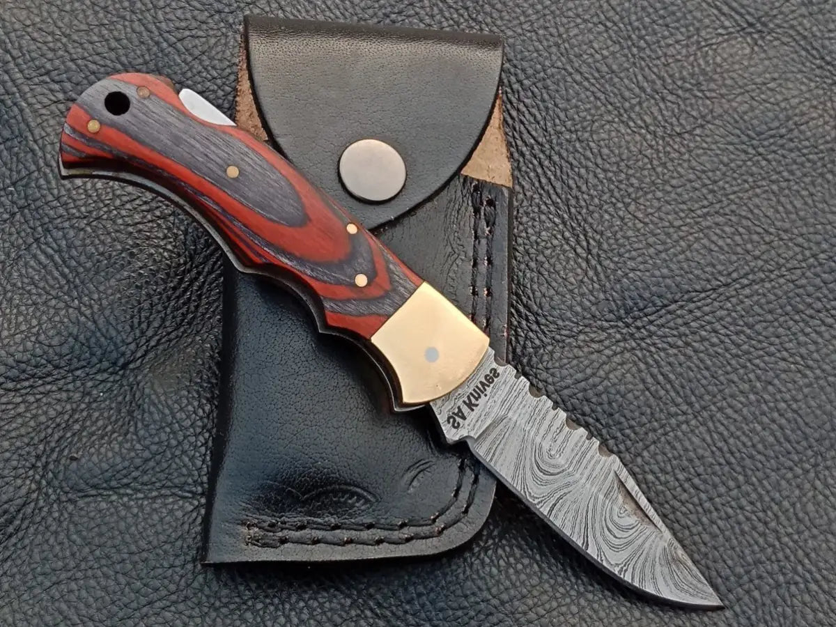 Handmade Damascus Steel Folding Knife SAF005 with intricate blade design and craftsmanship