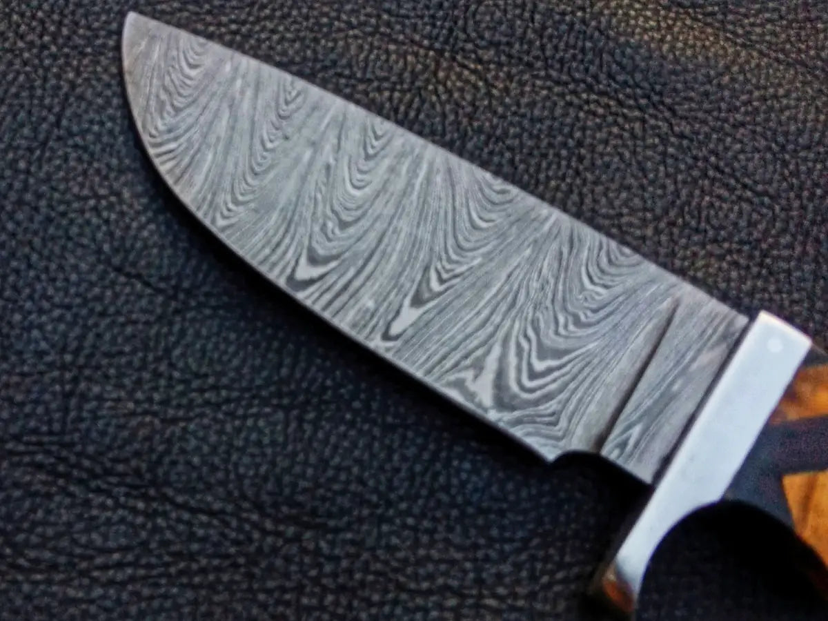 Handmade Damascus Steel Hunting Knife C1971 showcasing exquisite craftsmanship and design