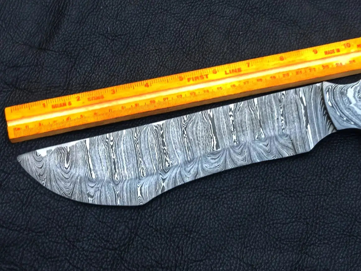 Handmade Damascus steel Bush Tracker Knife with ruler for size reference