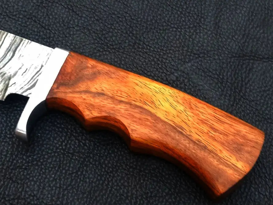 Handmade Damascus Steel Bowie knife with a beautifully crafted wooden handle