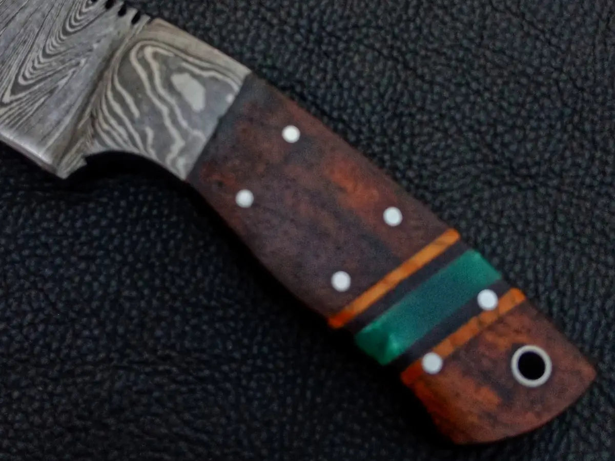 Handmade Damascus Steel Knife - C239 featuring a decorative handle and unique patterns