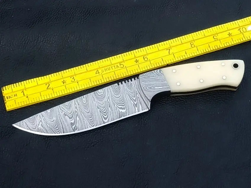 Handmade Damascus Steel Knife - C236 with a bone handle, showcasing intricate craftsmanship