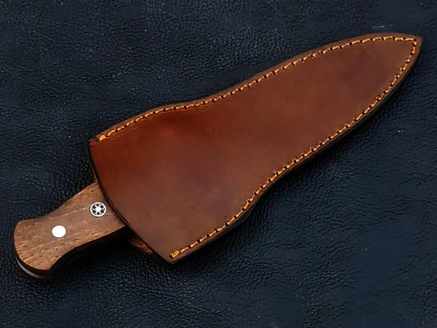 Knife in brown leather sheath, showcasing Handmade Damascus Steel Dagger-C116