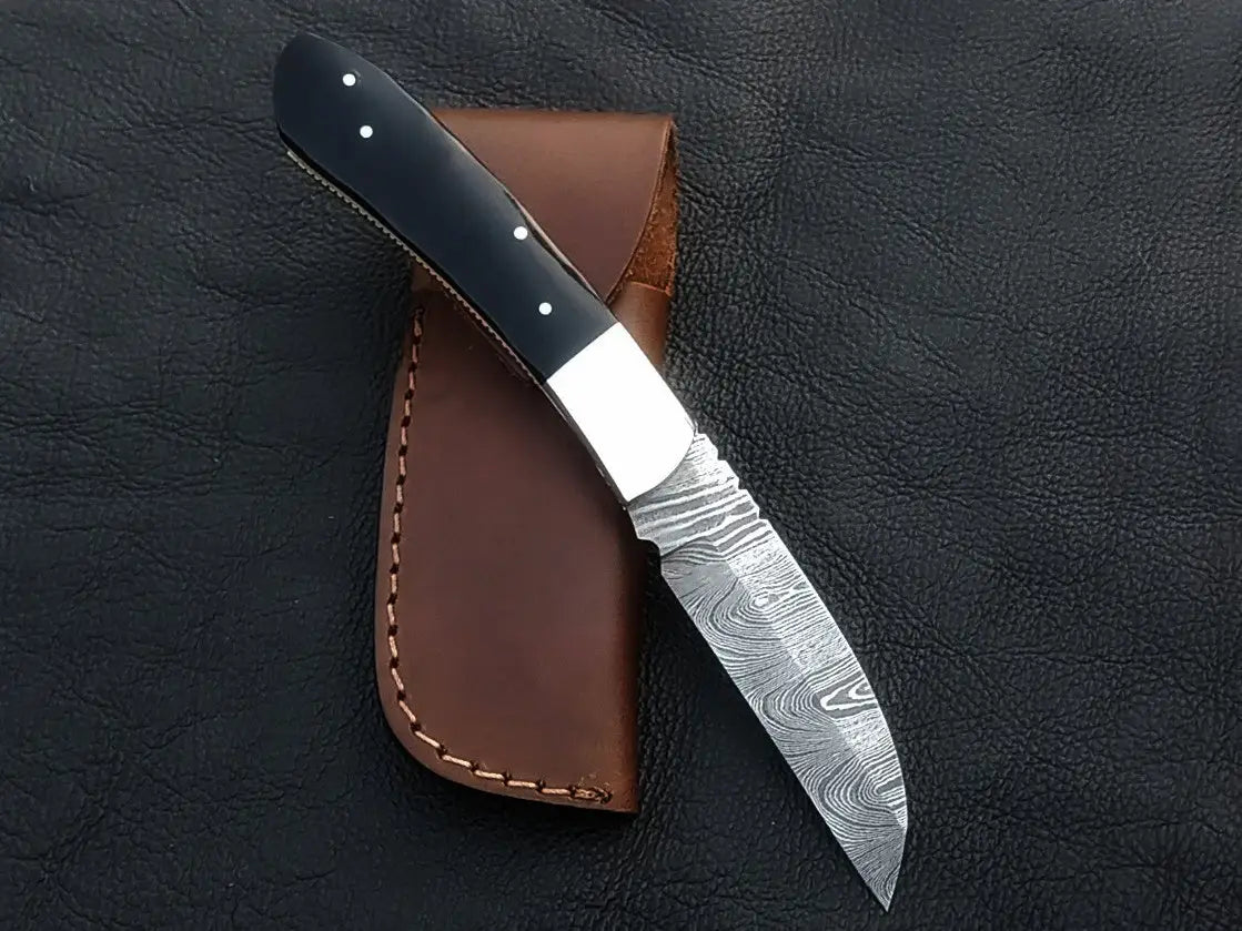 Handmade Damascus Steel Folding Knife C168 with black handle and intricate blade design