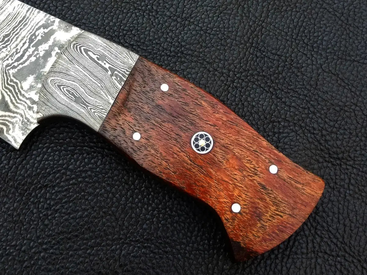 Handmade Damascus steel hunting knife with a wooden handle for outdoor enthusiasts