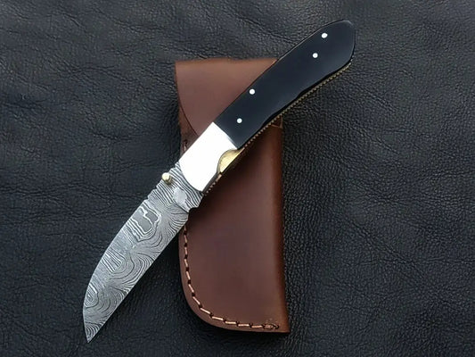 Handmade Damascus Steel Folding Knife C168 with intricate blade patterns and craftsmanship