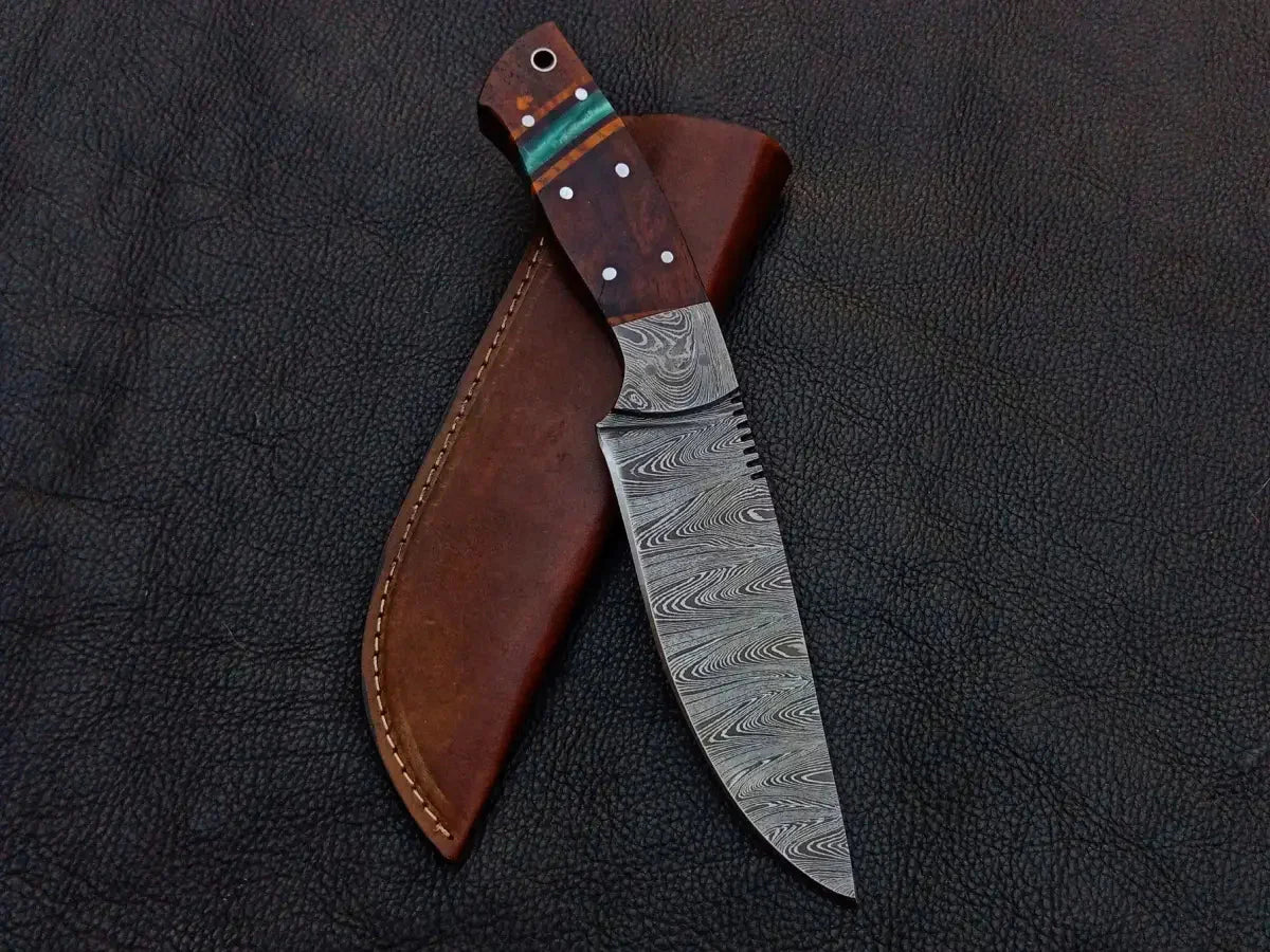 Handmade Damascus Steel Knife C239 with leather sheath, showcasing intricate blade design