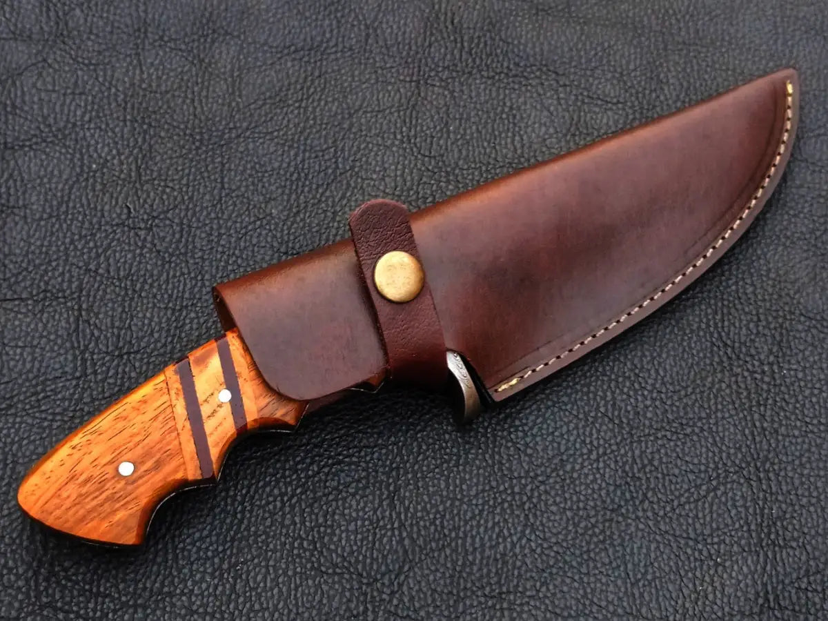 Handmade Damascus Steel Hunting Knife in leather sheath for premium outdoor use