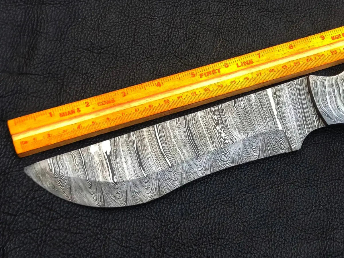 Handmade Damascus Steel Bush Tracker Knife-C190 with ruler showcasing its craftsmanship