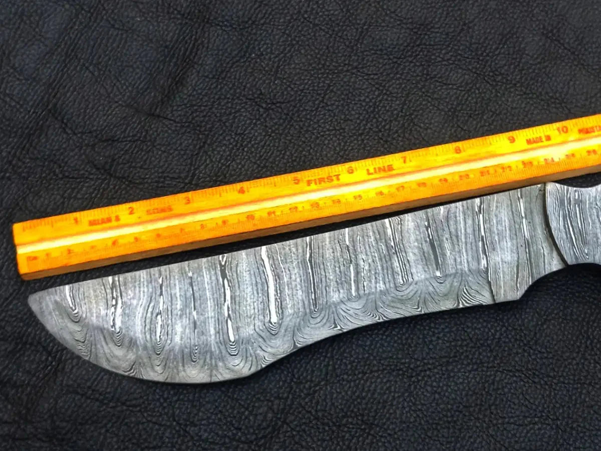 Damascus steel knife blade and ruler showcasing Handmade Damascus Steel Bush Tracker Knife-C189