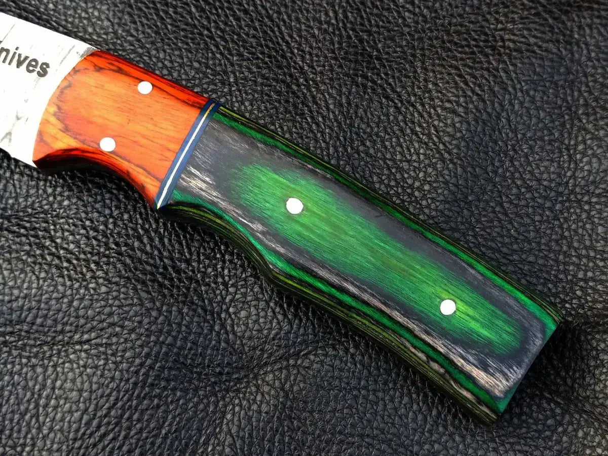 Knife handle featuring green grey wood with brown accents for the Orange Bolster Skinning Knife
