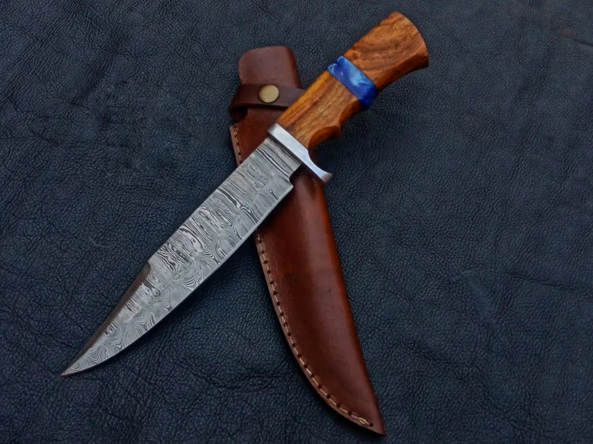 Handmade Damascus Steel Bowie knife with a leather sheath for hunting enthusiasts