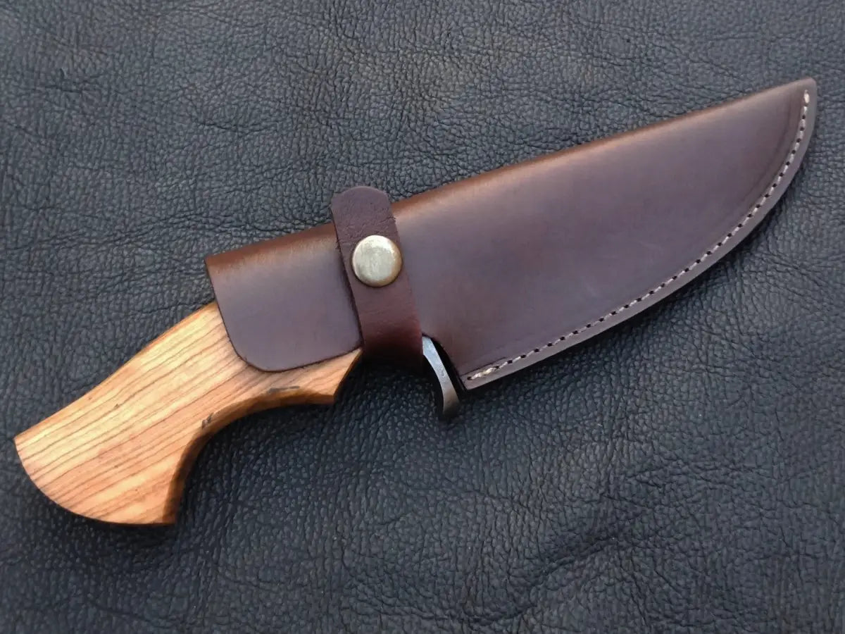 Wood-handled Damascus Steel Hunting Knife in a leather sheath for outdoor enthusiasts