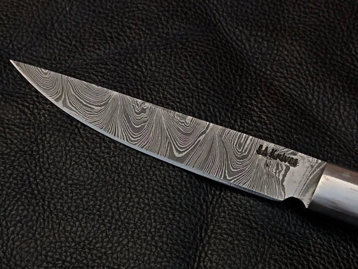 Damascus steel bird and trout knife with rosewood handle showcasing high-quality damascus steel