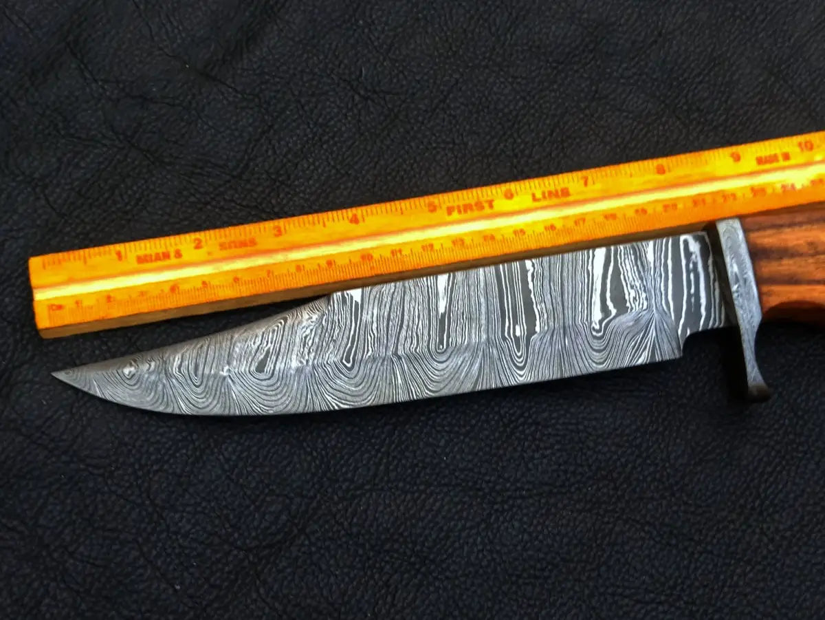 Handmade Damascus Steel Bowie C147 featuring intricate patterns and a sharp blade