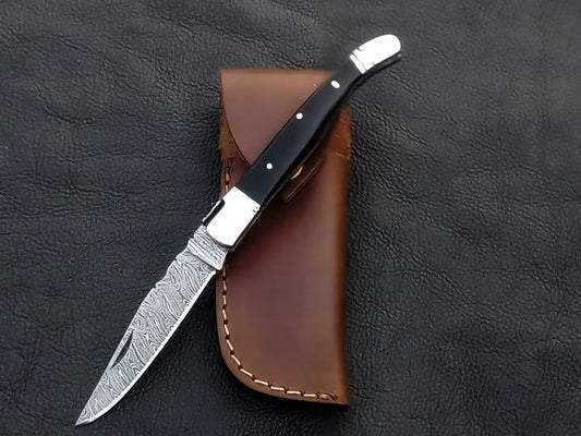 Handmade Damascus Steel Folding Knife - C162 showcasing intricate blade patterns