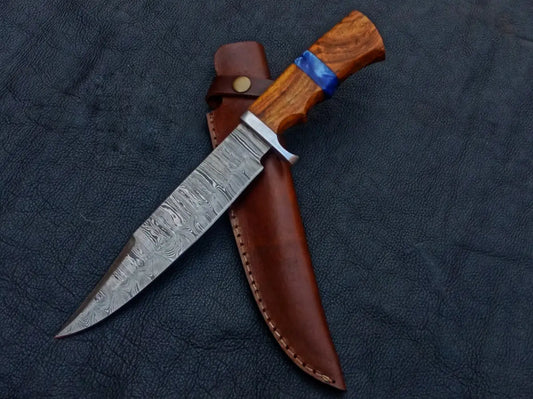 Handmade Damascus Steel Bowie knife with a leather sheath for hunting enthusiasts