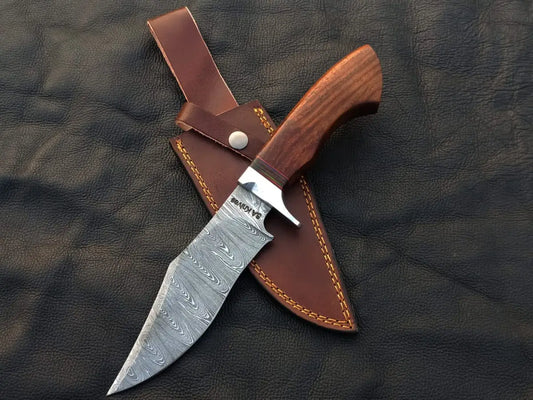 Handmade Damascus steel Bowie knife with leather sheath for hunting and outdoor use