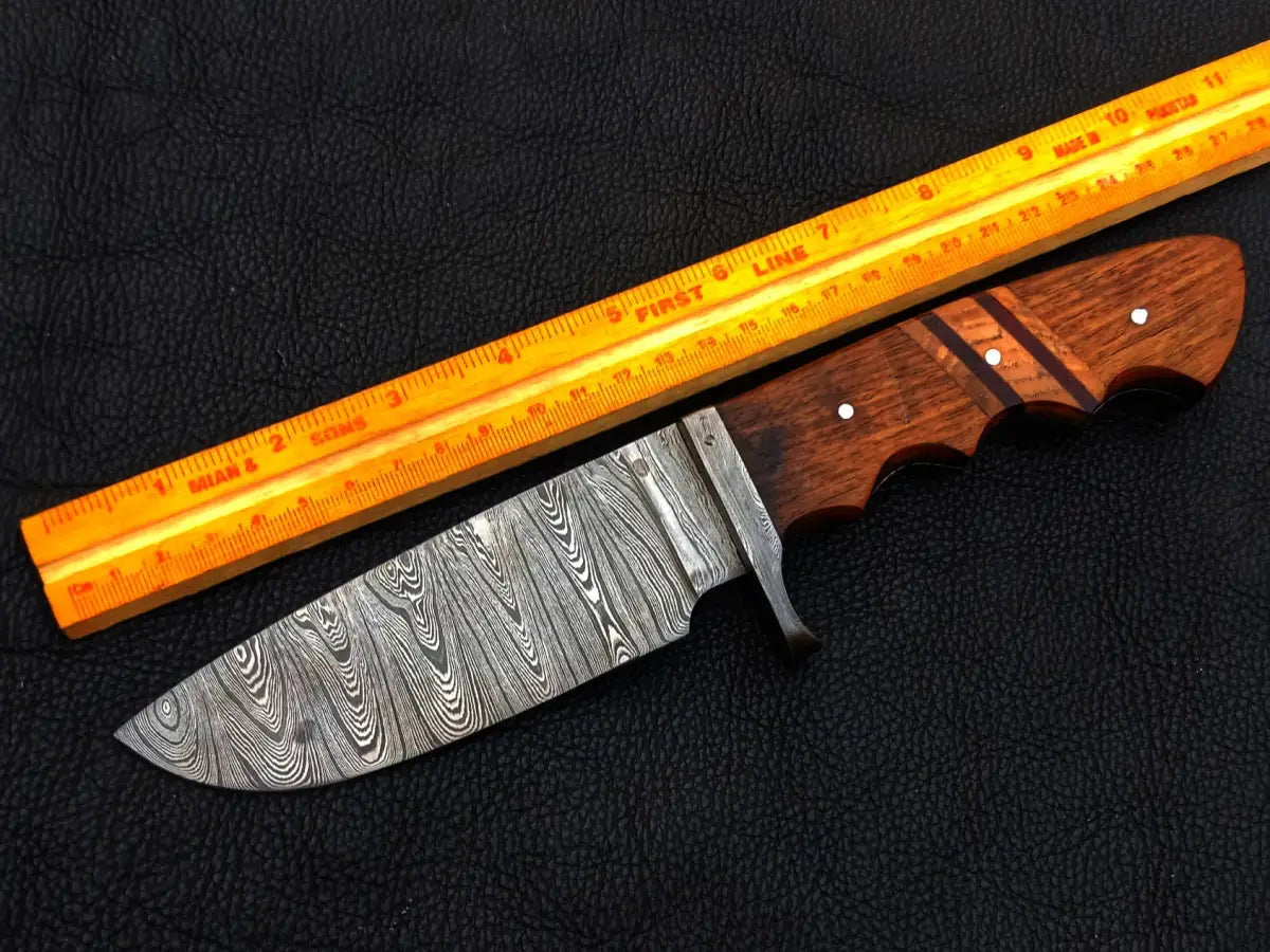 Handmade Damascus Steel Hunting Knife with a wooden handle, featuring intricate patterns