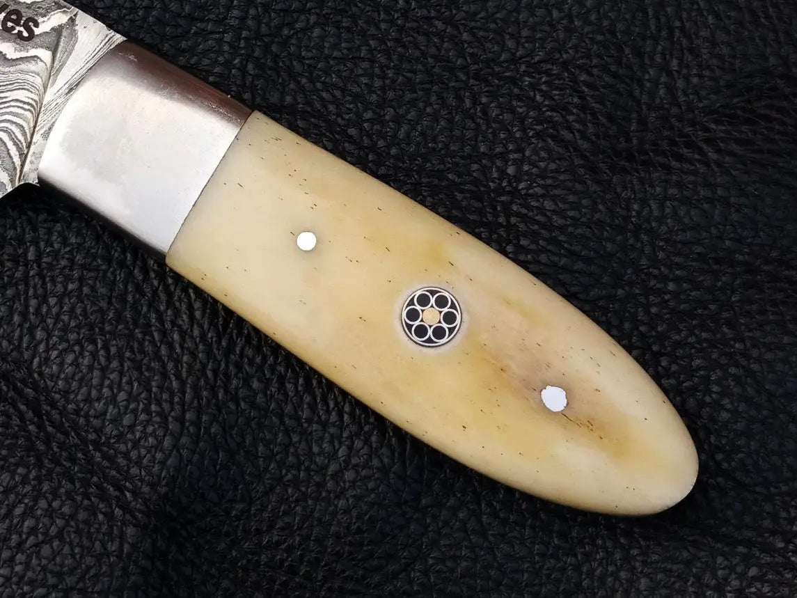 Decorative knife handle of Camel Bone Skinning Knife SAK004 with intricate design