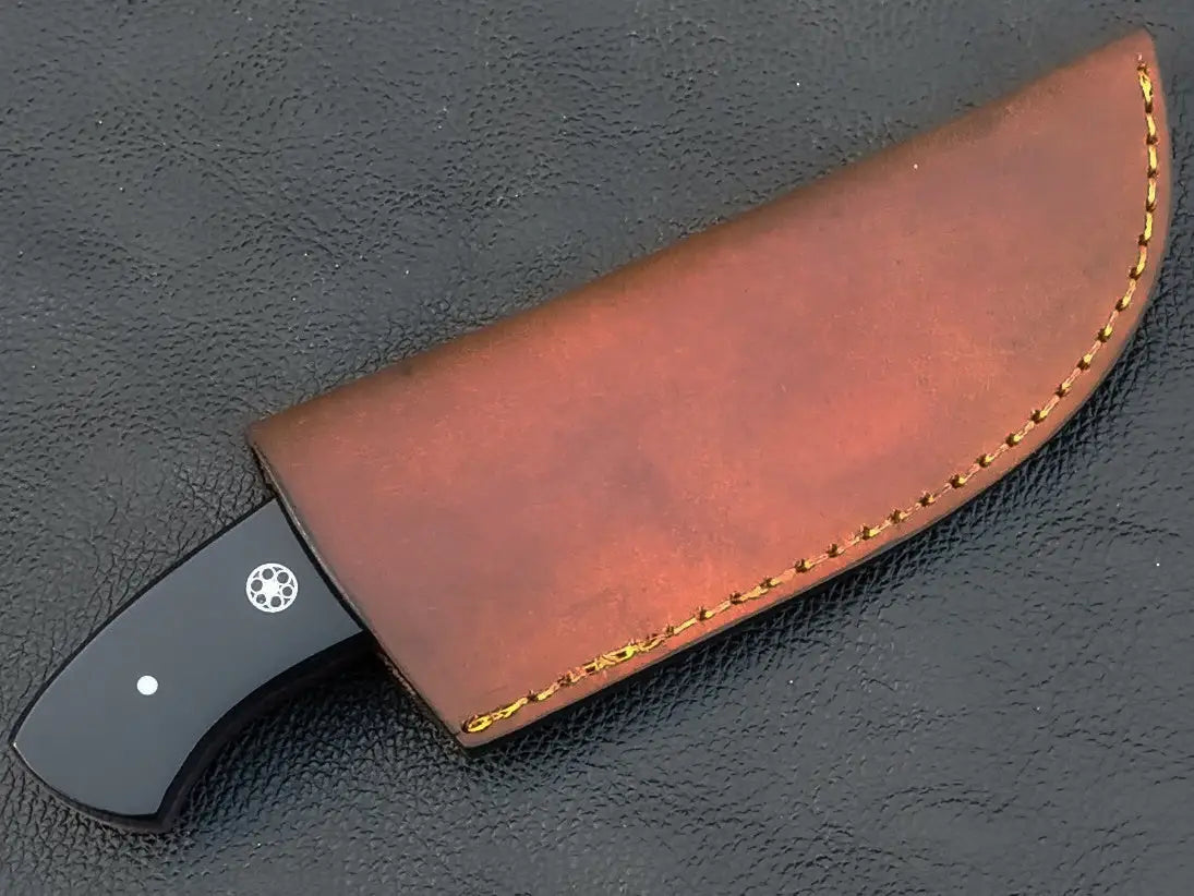 Damascus steel skinner knife sheath displayed - C93