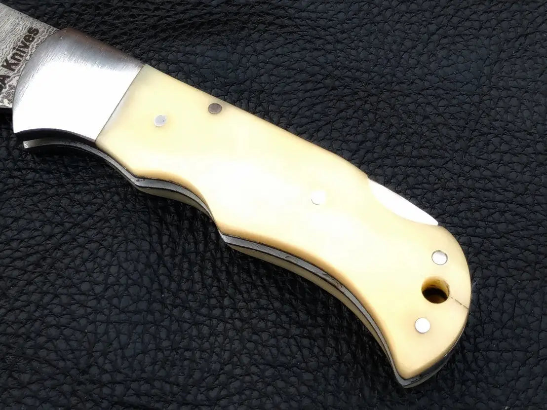 Handmade Damascus Steel Folding Knife-C89 on black background
