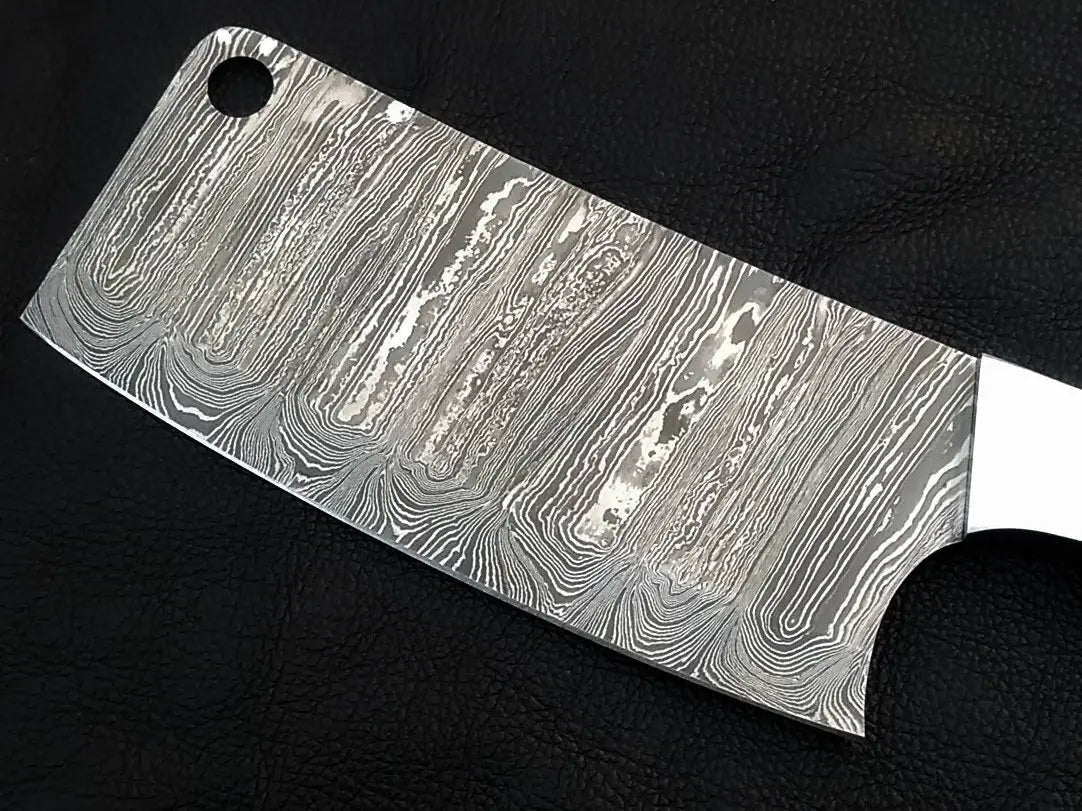 Handmade Damascus steel cleaver with patterned blade