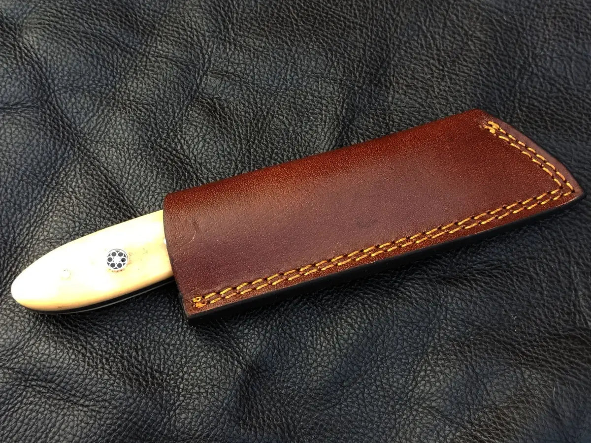 Knife in leather sheath for the Camel Bone Skinning Knife SAK004, ideal for outdoor use