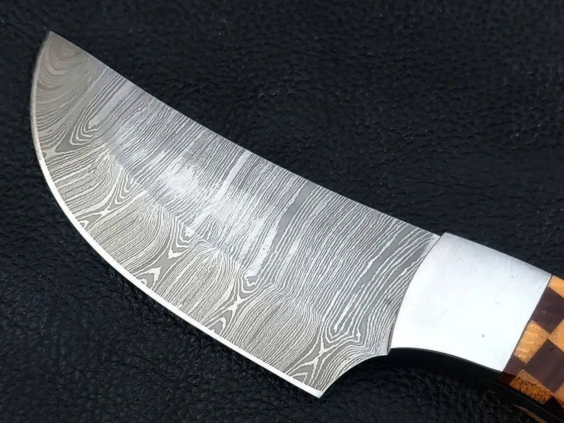 Handmade Damascus Steel Knife with Wooden Handle on Black Surface