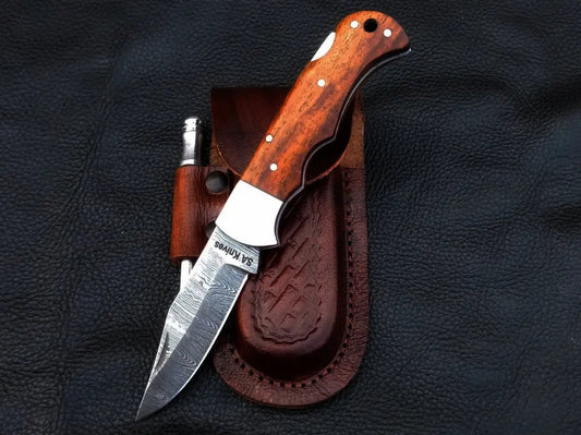 Damascus steel folding knife with leather sheath